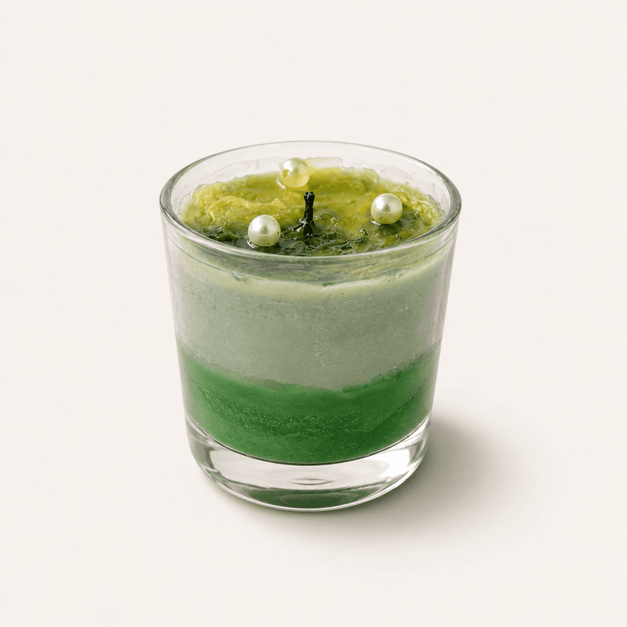 Wave and pearl toppled candle